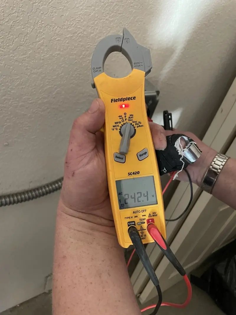 Voltage testing with clamp meter during Generator Installation in Fremont